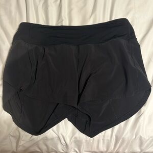 Size 8 speed up mid-rise lined shorts 4”
